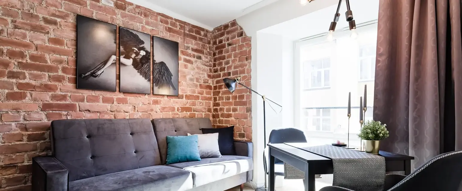 a living room with a couch and a table