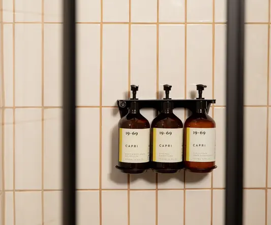 a group of bottles on a wall