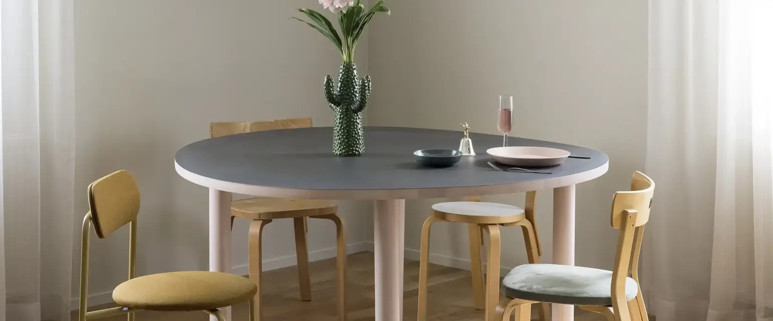 a table with a cactus in it
