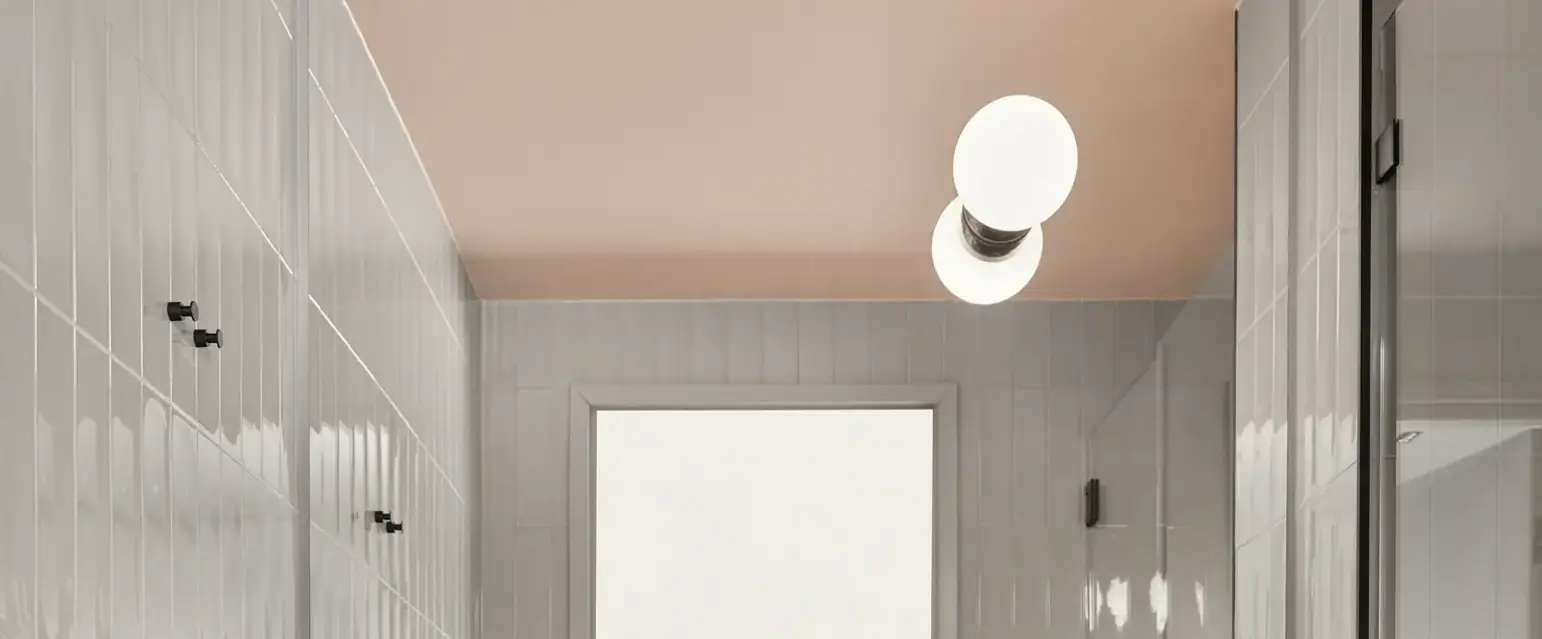 a bathroom with a green sink and toilet