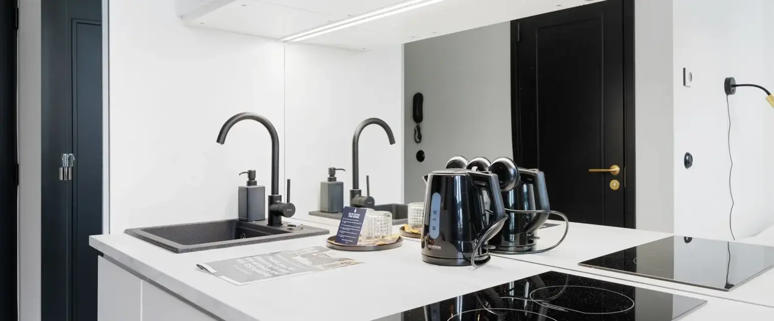 a kitchen with a stove and sink