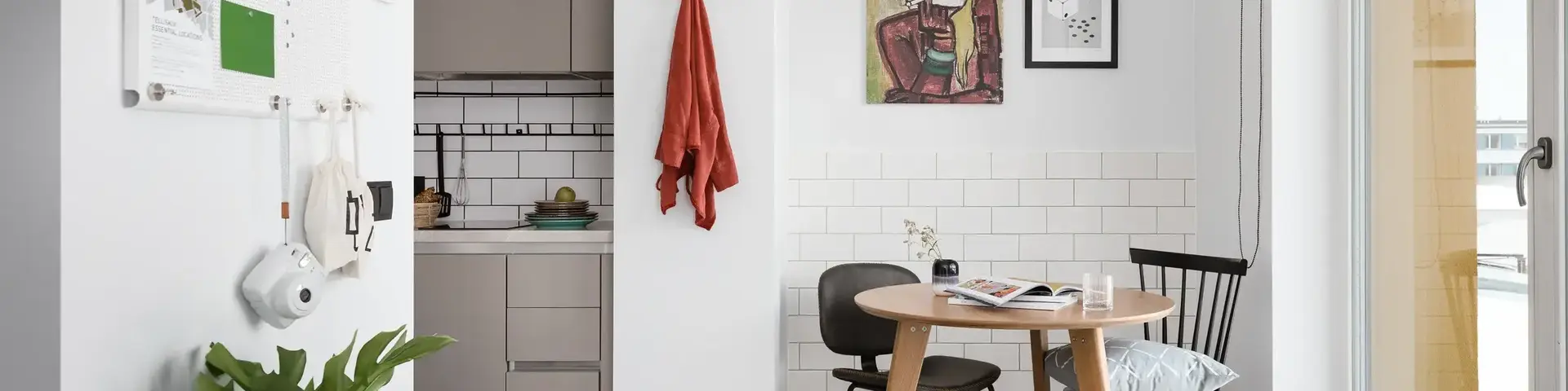 a dining room with a table and chairs