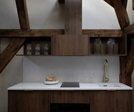 a kitchen with a sink and a stove