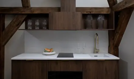 a kitchen with a sink and a stove