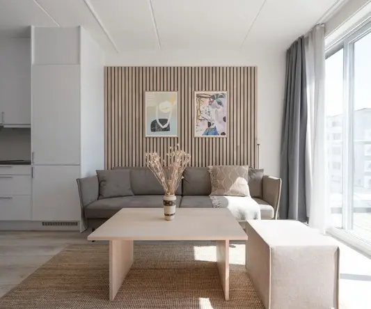 a living room with a couch and a coffee table