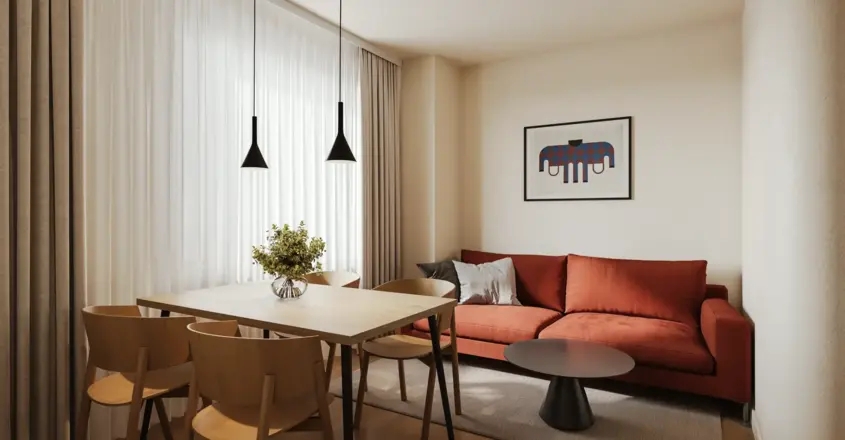 a living room with a couch and table