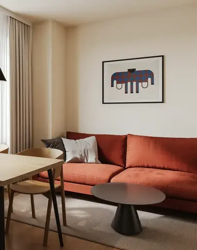 a living room with a couch and table