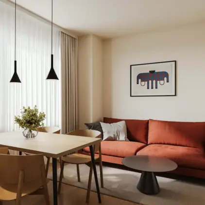 a living room with a couch and table