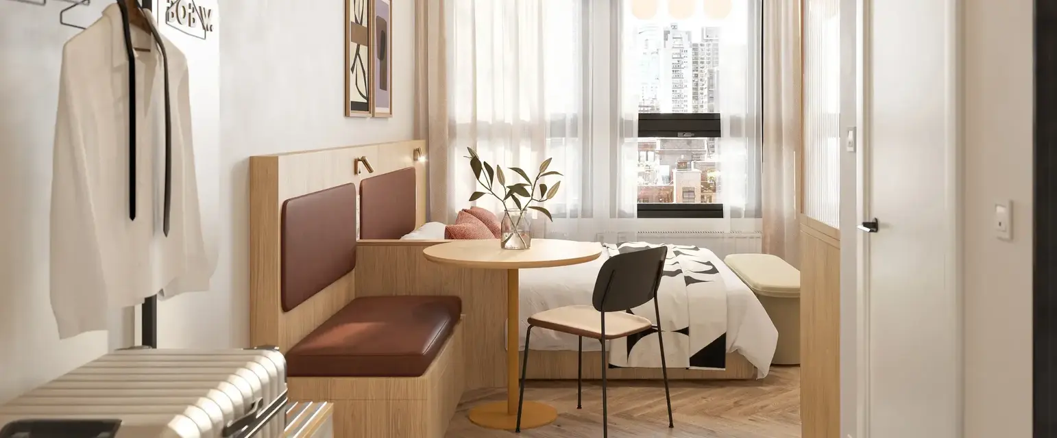 a room with a table and chairs