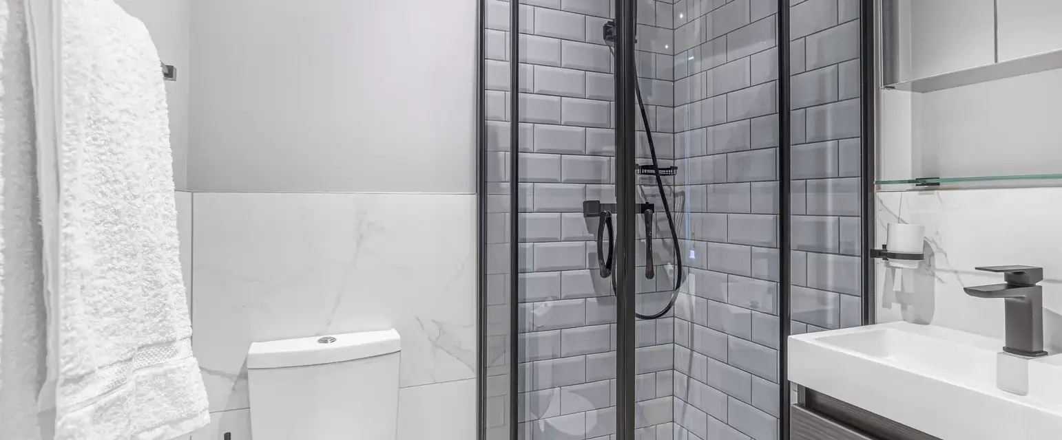 a shower with a glass door