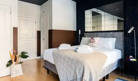 a bed with towels on it