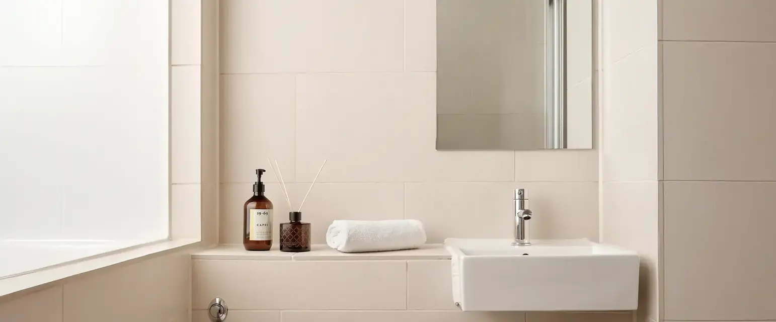 a bathroom with a sink and toilet