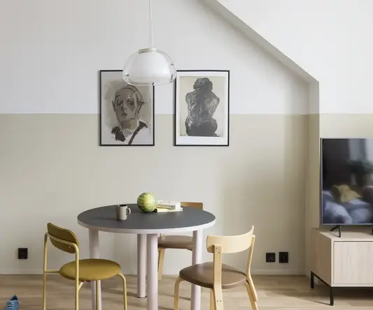 a table and chairs in a room