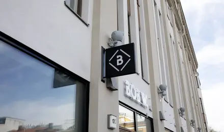 a sign on the side of a building