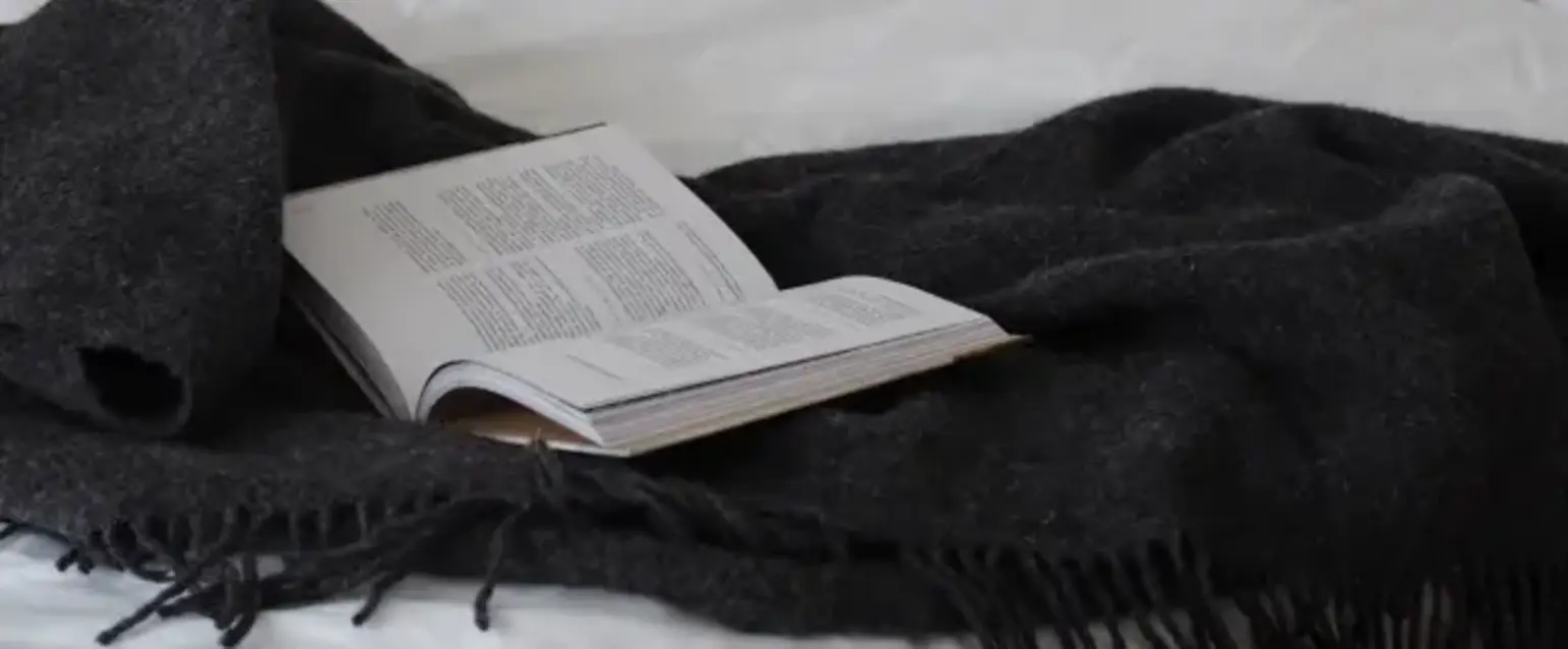 a book on a bed