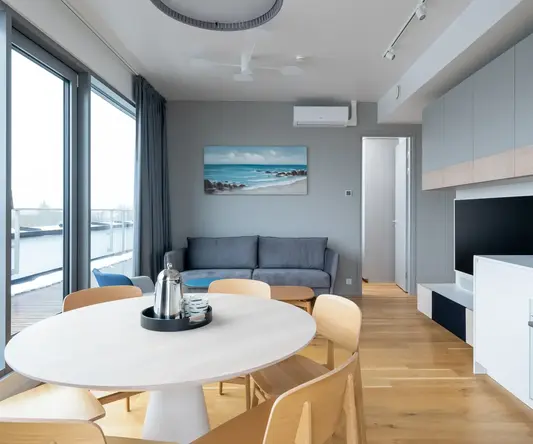 a room with a table and chairs