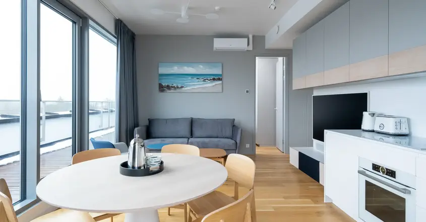 a room with a table and chairs