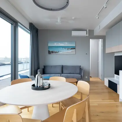 a room with a table and chairs