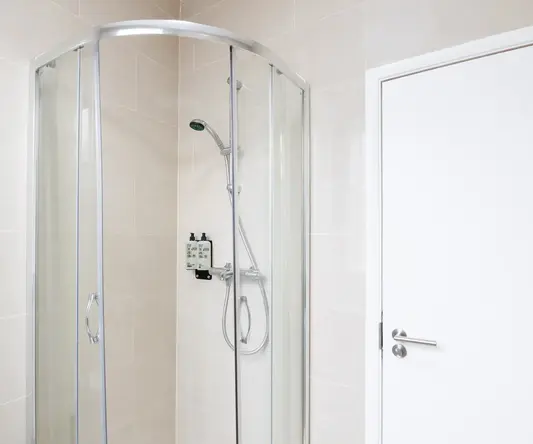 a shower with a glass door