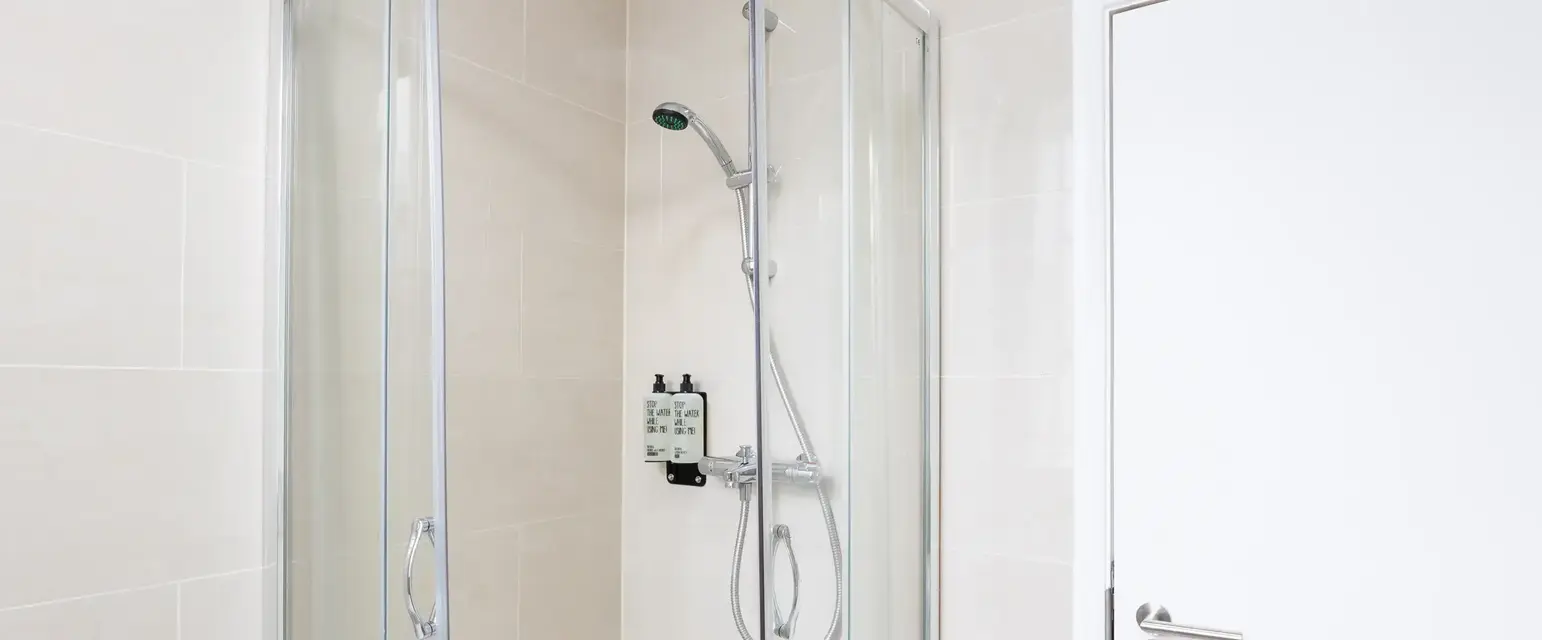 a shower with a glass door