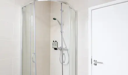 a shower with a glass door
