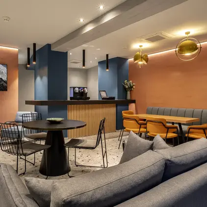 a room with a table and chairs