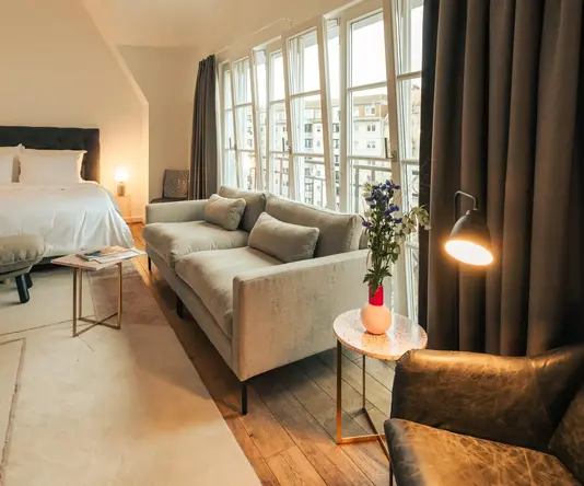 a room with a bed and a couch