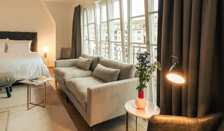 a room with a bed and a couch