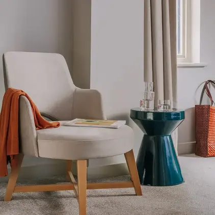 a chair next to a table