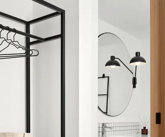 a bathroom with a mirror and sink