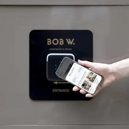 a hand holding a phone