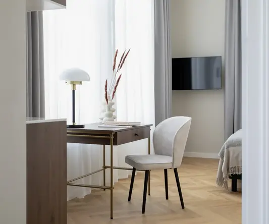 a desk and chair in a room