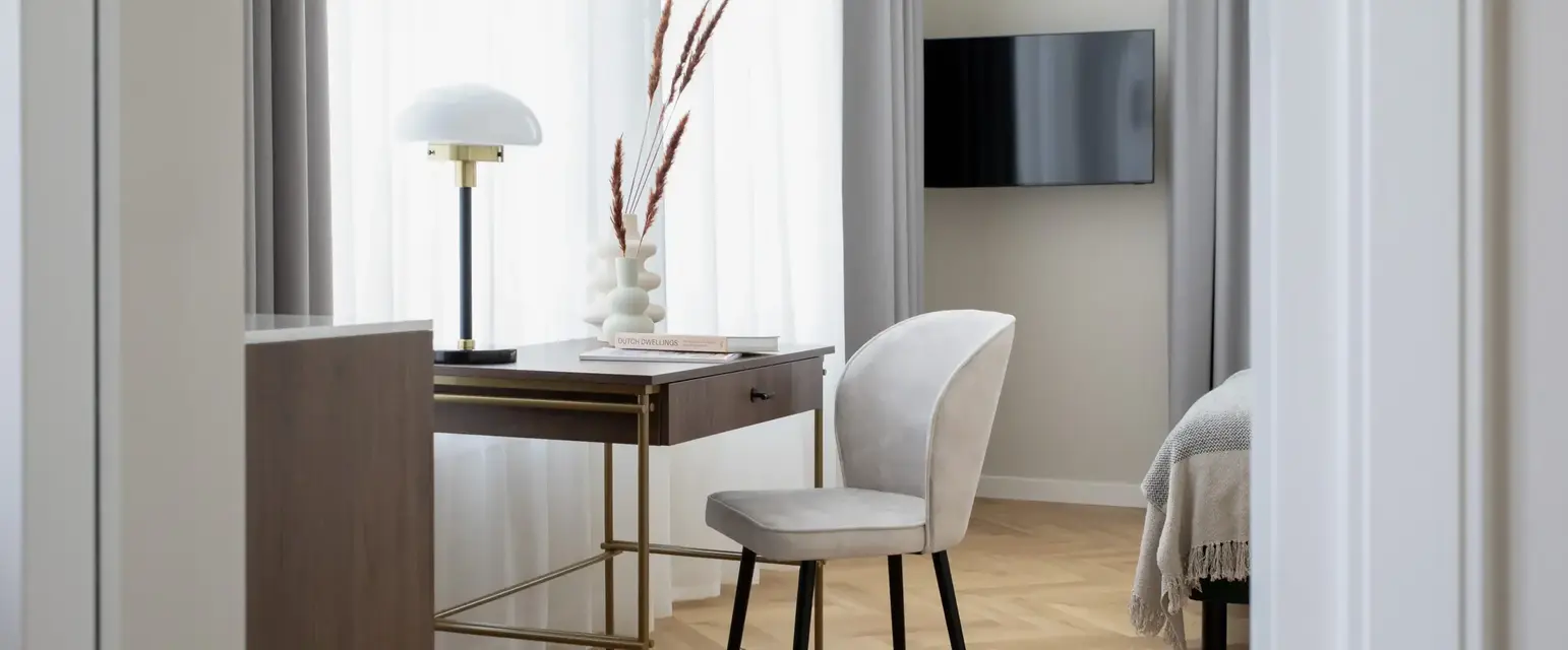 a desk and chair in a room