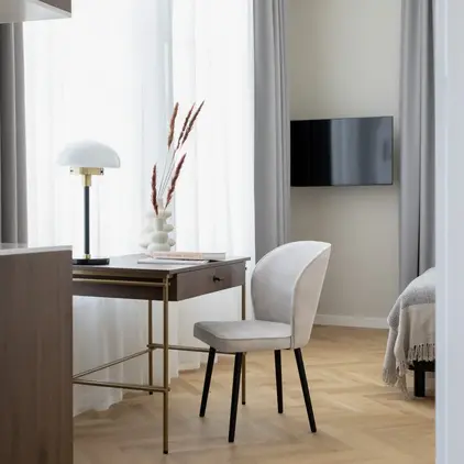 a desk and chair in a room