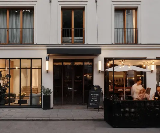 a building with a couple of people in front of it