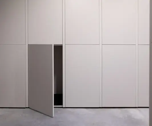a white cabinet with a door open