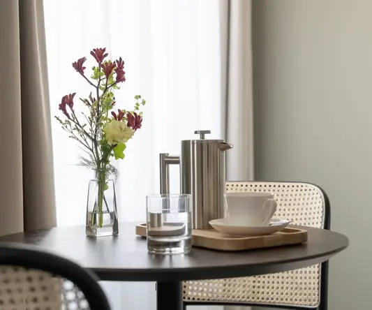 a table with a cup and saucer on it