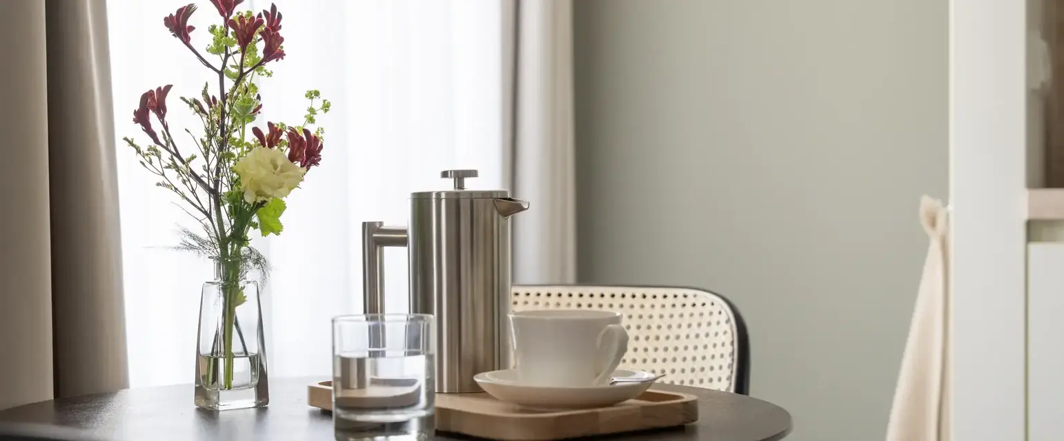a table with a cup and saucer on it