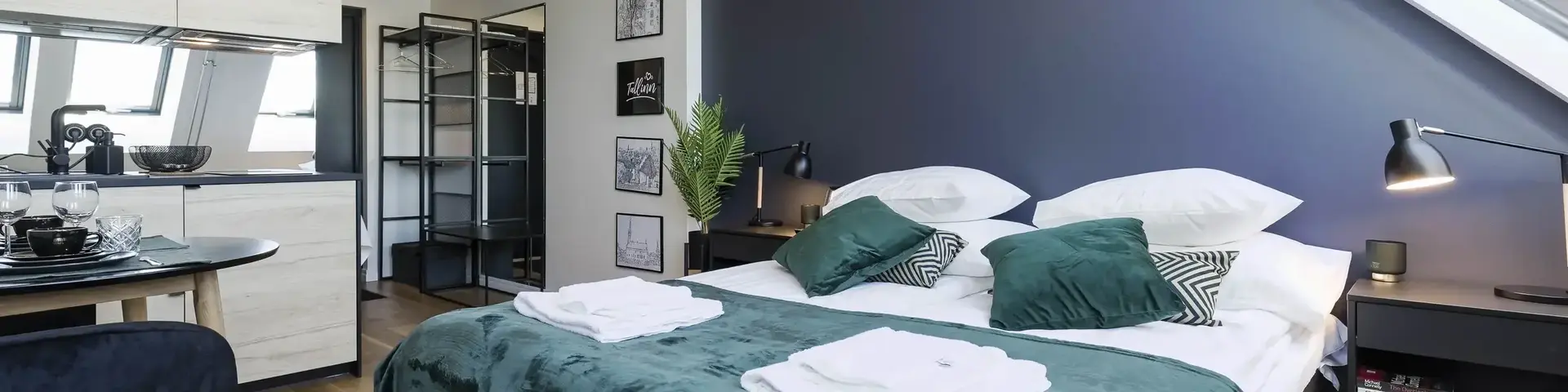 a bedroom with a bed and a ceiling fan