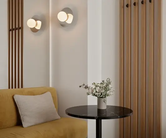 a table with a vase of flowers on it