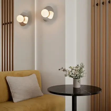 a table with a vase of flowers on it