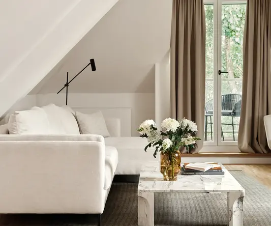 a living room with a couch and a coffee table