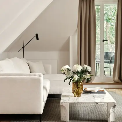 a living room with a couch and a coffee table