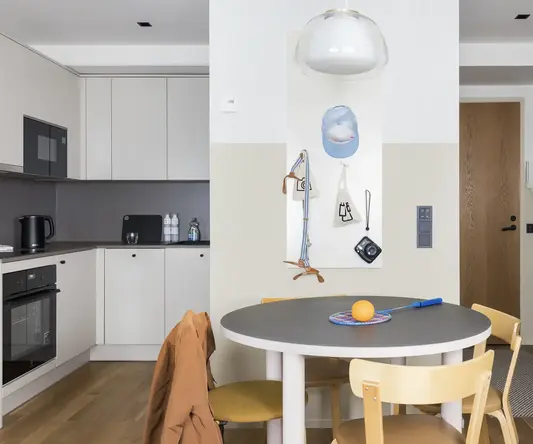 a table and chairs in a room