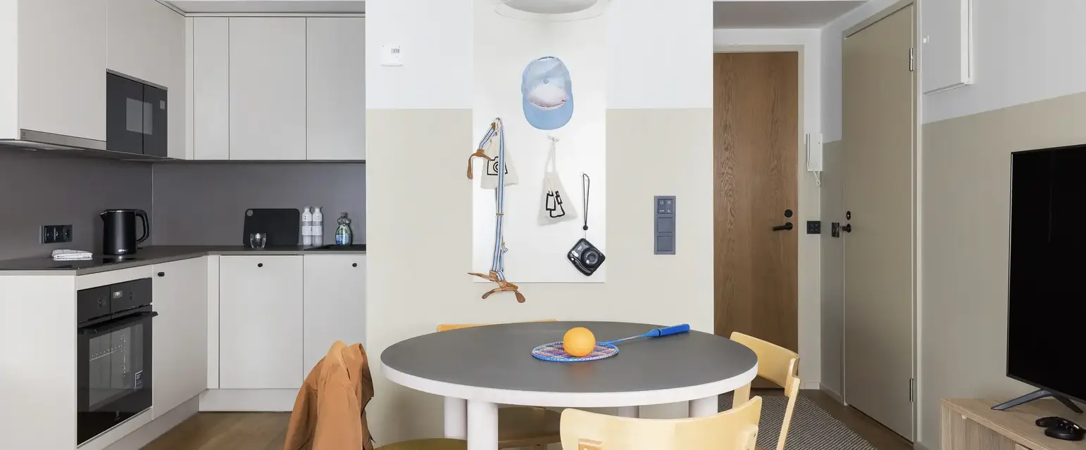 a table and chairs in a room