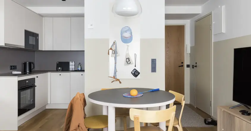 a table and chairs in a room