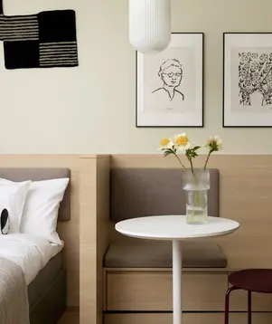 a table with flowers in a vase on it