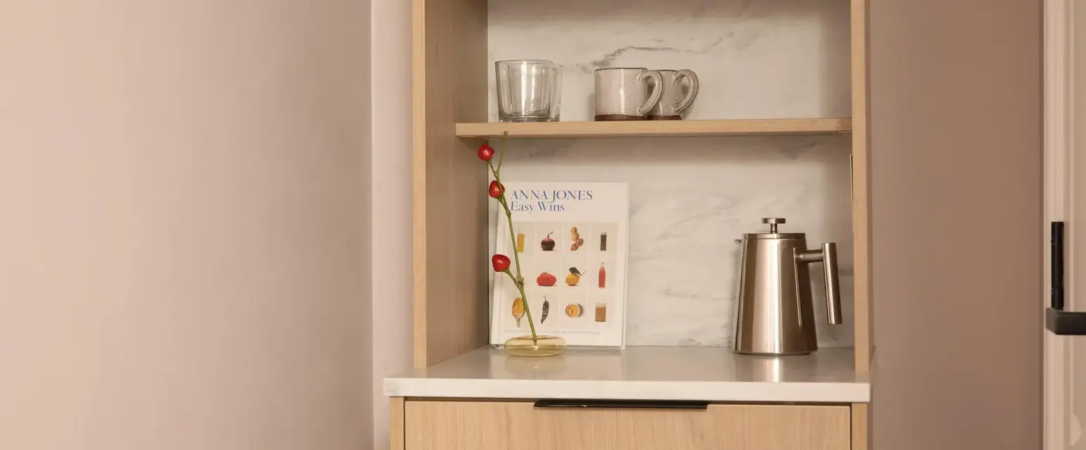 a microwave on a shelf