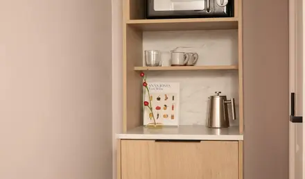 a microwave on a shelf