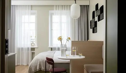 a room with a bed and a table